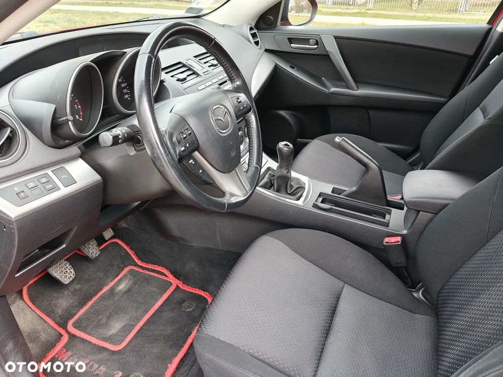 Mazda 3 2.0 Exclusive + - 12
