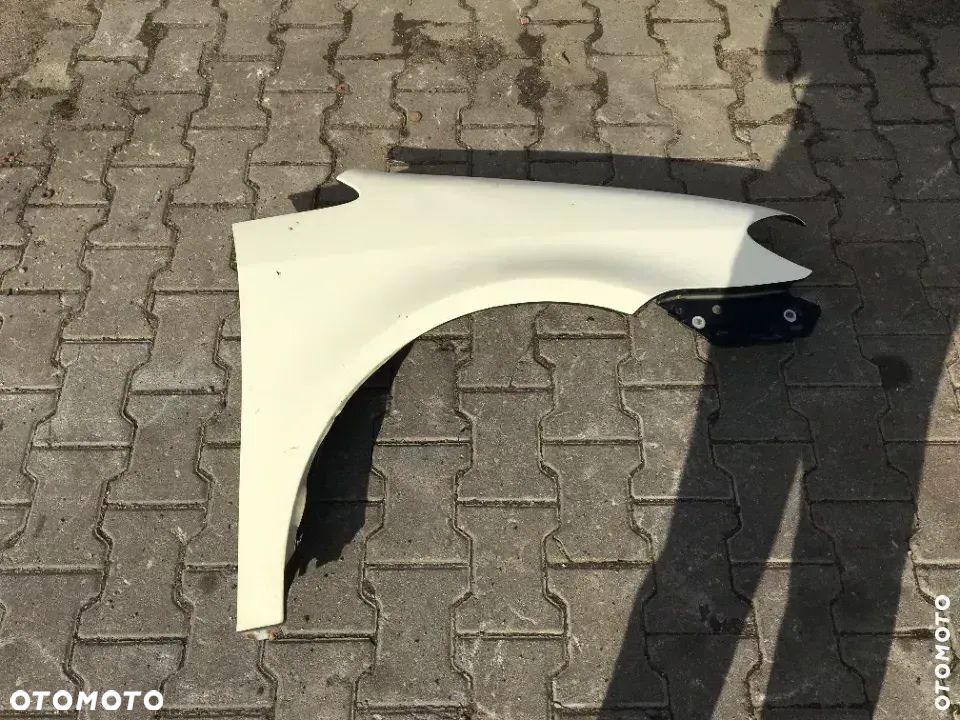 Volkswagen Touran I Lift błotnik prawy - 1