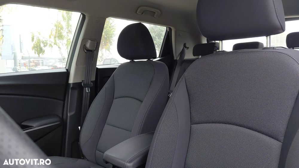 KG Mobility Tivoli - 11