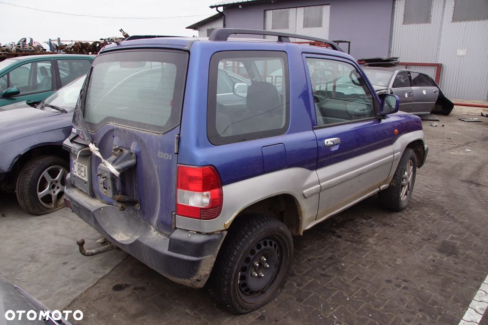 Auto na części - Mitsubishi Pajero Pinin 2.0 GDI 129 KM 4G94 V5M21 TH9B 2003R Silnik Skrzynia Drzwi Maska Błotnik Klapa Zderzak Lampa Lusterko Klamka Szyba Deska Kokpit Sterownik Moduł Czujnik Licznik Wyświetlacz Panel Kierownica - 5