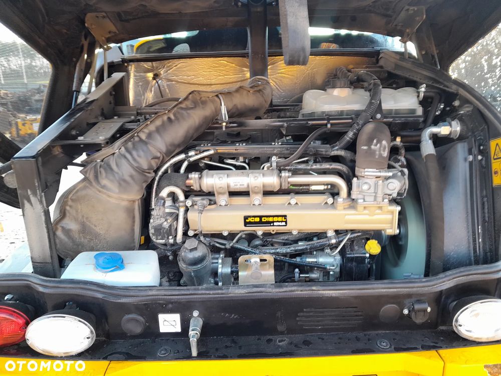 JCB 409 - 16