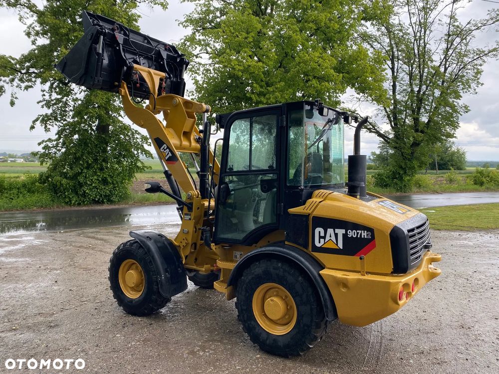 Caterpillar CAT 907H2, 2014 ROK, 6000 MTH, ŁYŻKA OTWIERANA + WIDŁY, z NIEMIEC, SUPER STAN, - 17