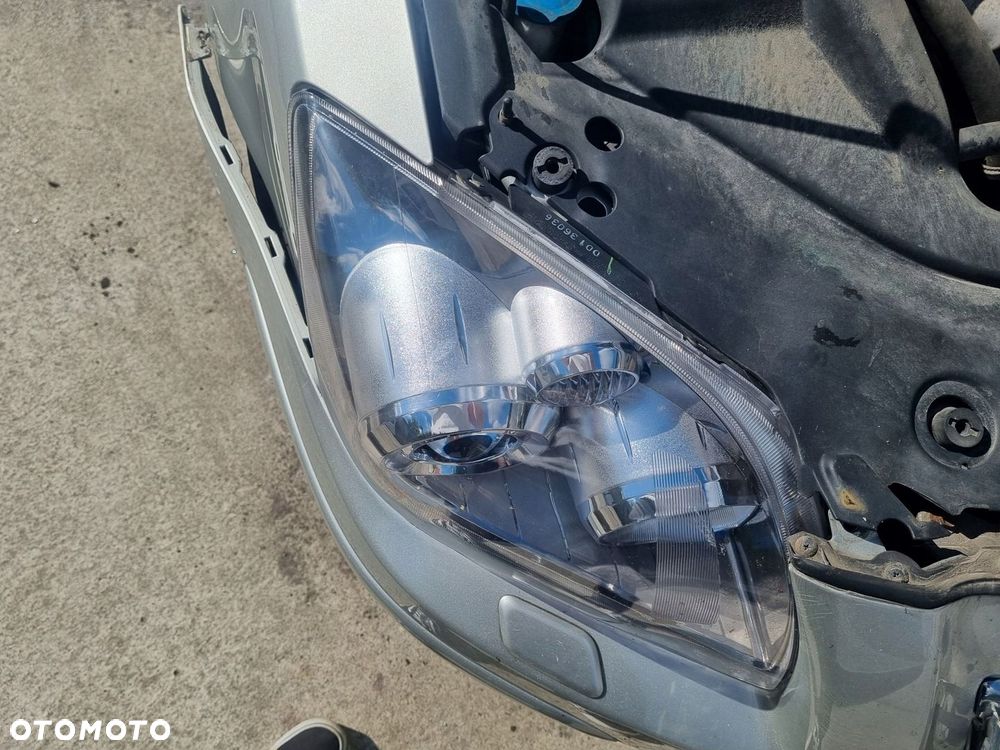 TOYOTA AVENSIS II T25 03-09 LIFT 2007 r. LAMPA PRAWY PRZÓD PP EU - 11