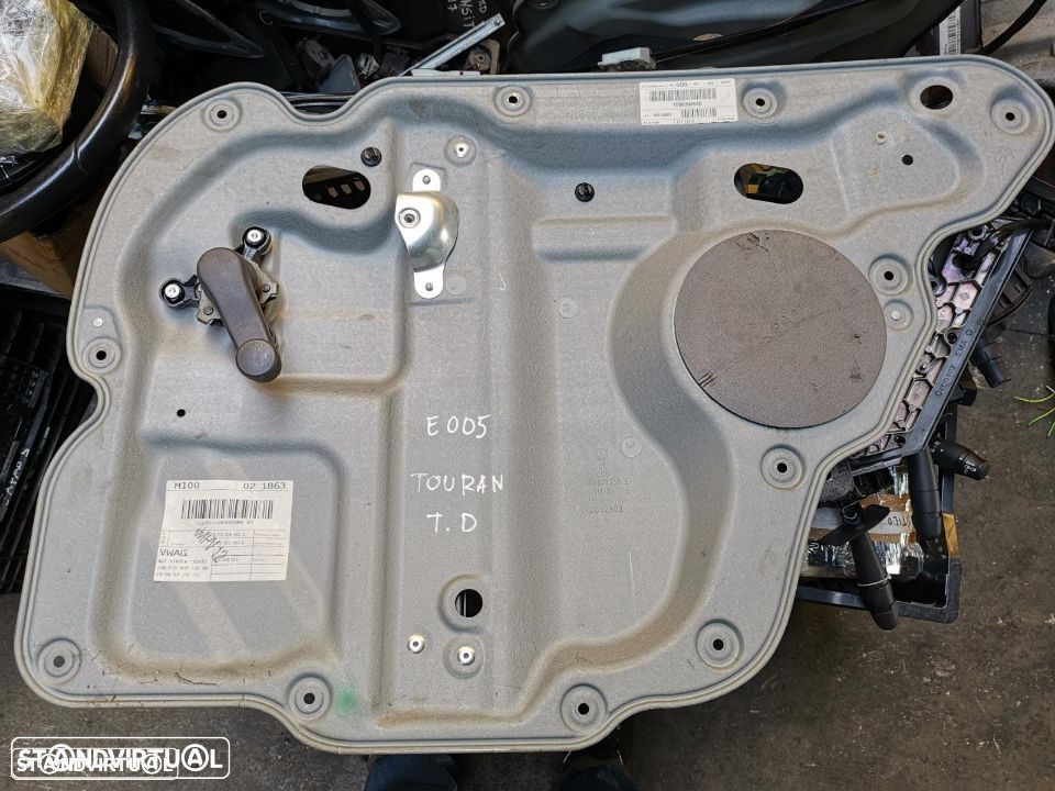 VW TOURAN ELEVADOR TRAS DTO MANUAL - 1