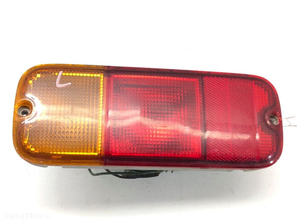 LAMPA ZDERZAKA LEWY TYŁ  SUZUKI JIMNY samochód terenowy zamknięty (SN) 1998 - 2022 1.5 DDiS 4x4 - 1