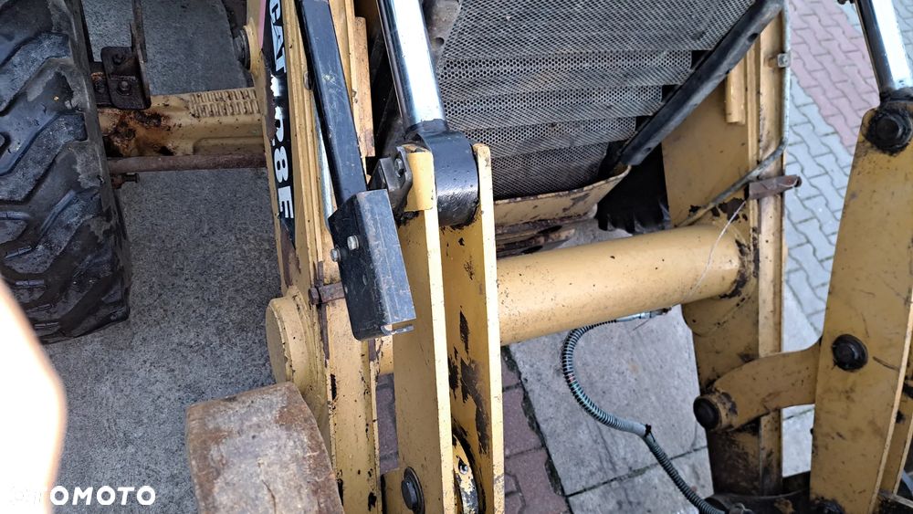 Caterpillar 428E - 12