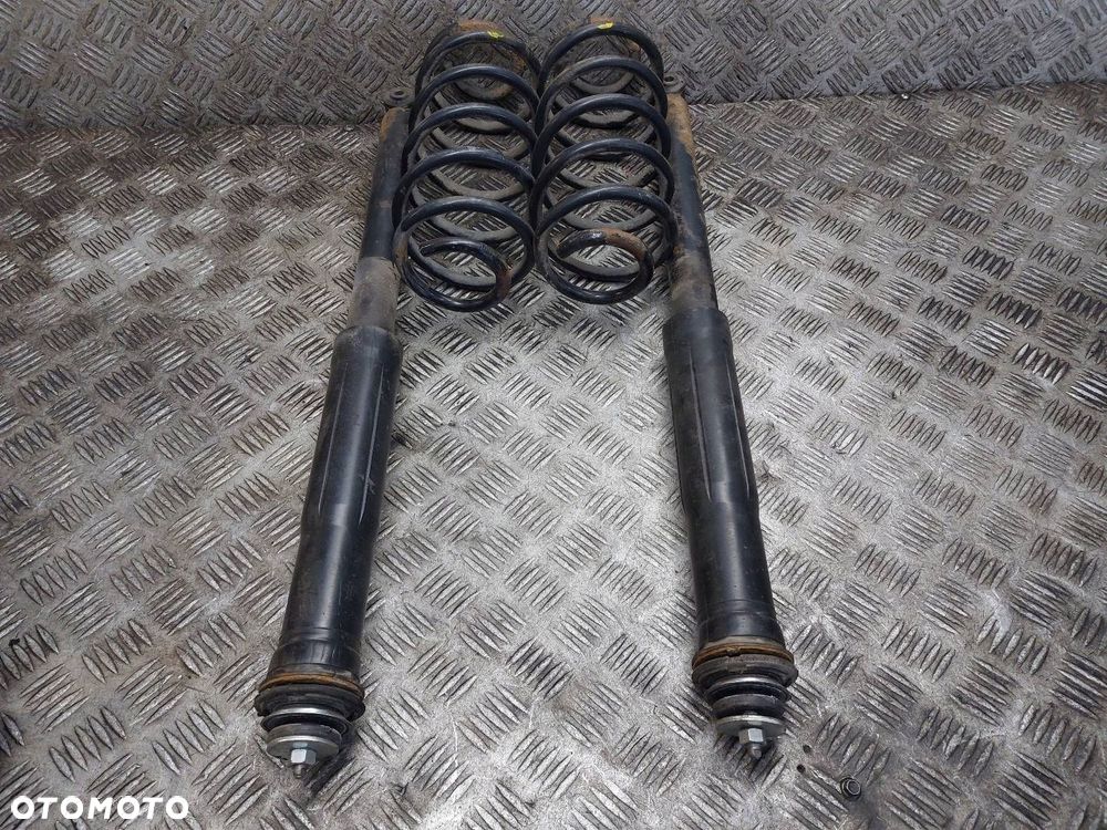 AMORTYZATORY + SPRĘŻYNY TYŁ KOMPLET TOYOTA YARIS II HB 5D - 1