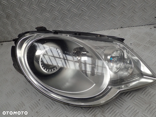 LAMPA PRAWA PRZOD VW EOS  XENON UK 1Q2941752B