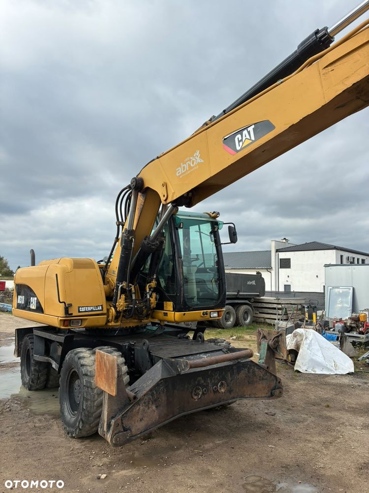 Caterpillar M318C - 11