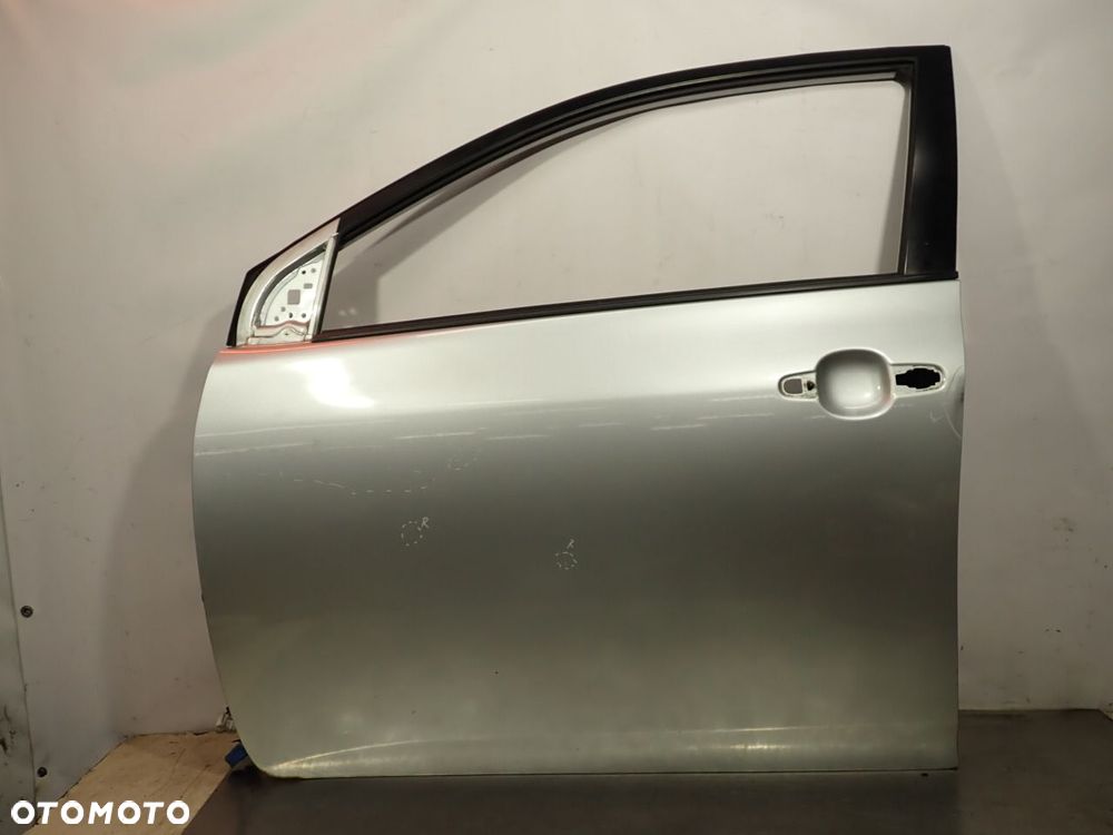 DRZWI LEWY PRZÓD TOYOTA COROLLA E15 KOL: 1F7 - 1