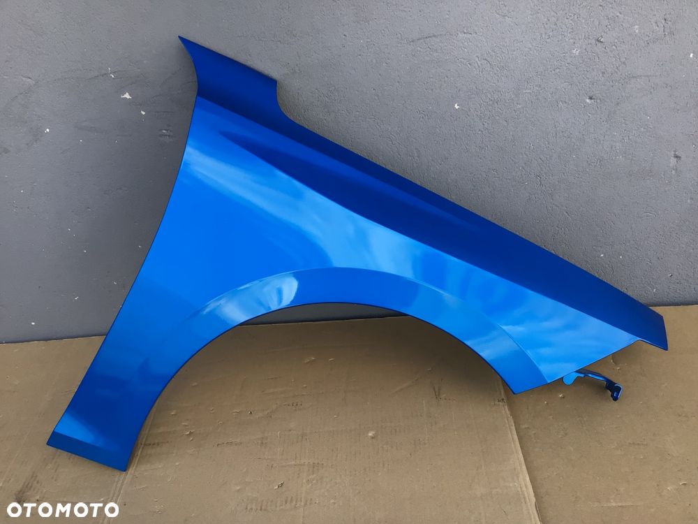 Błotnik przedni prawy Opel Astra L 6 Vl