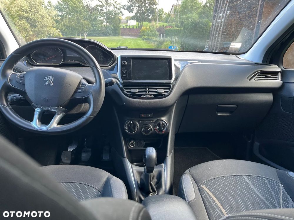 Peugeot 208 2013 photo 4