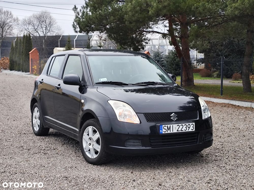 Suzuki Swift 1.3 GLX - 18