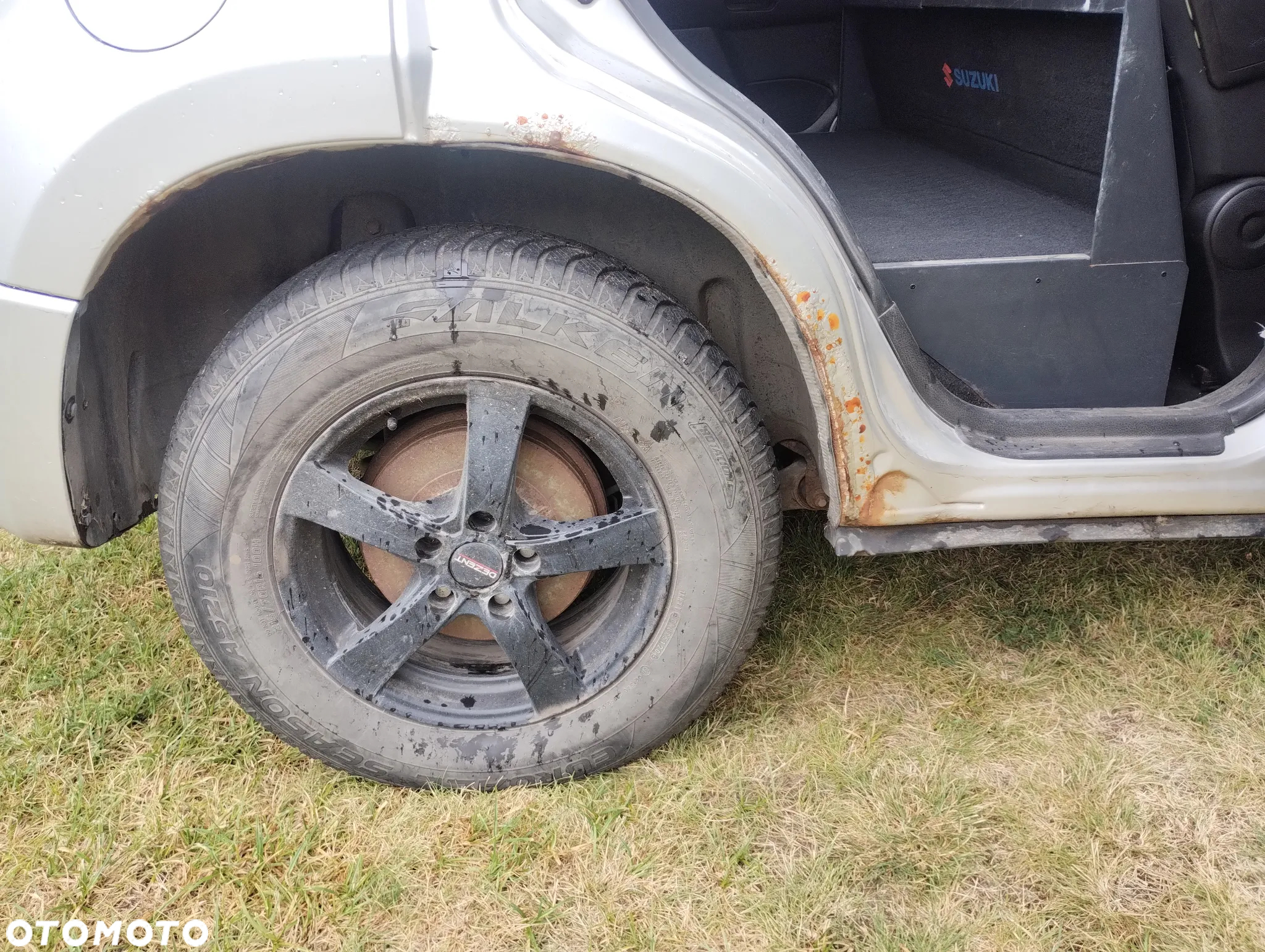 Suzuki Grand Vitara 2.0 - 14