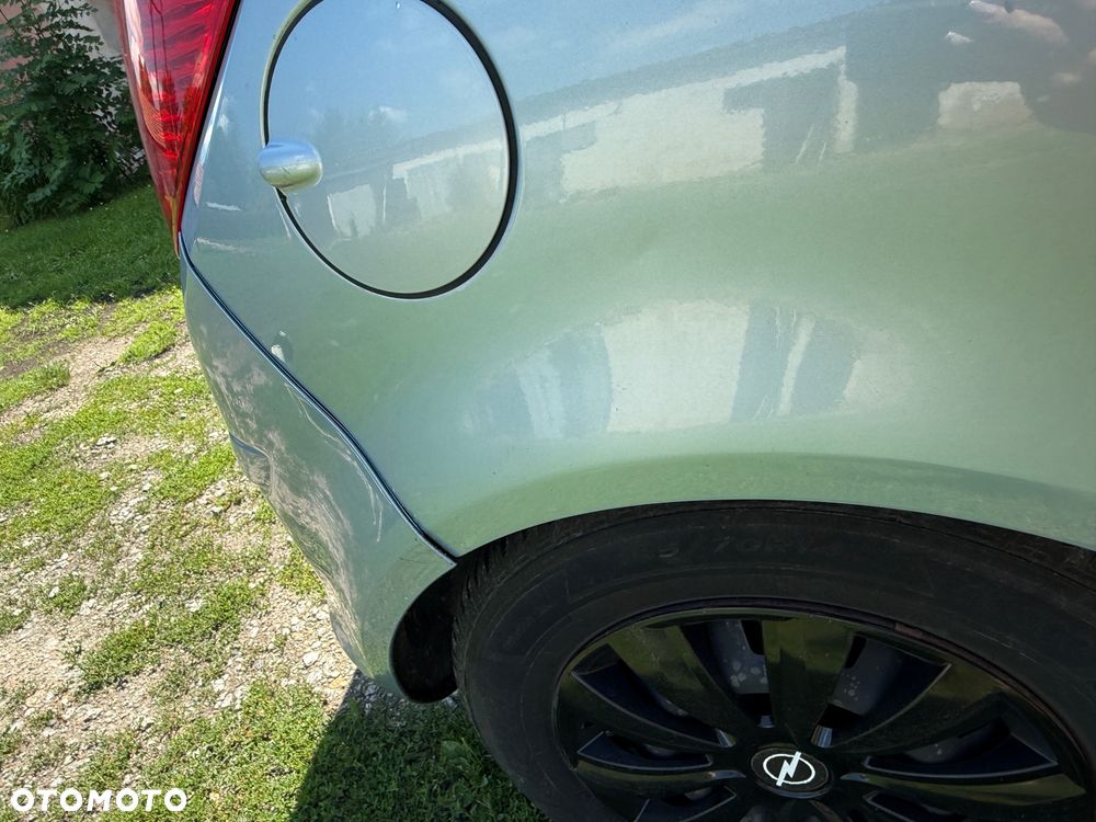 Opel Corsa 1.2 16V Cosmo - 12