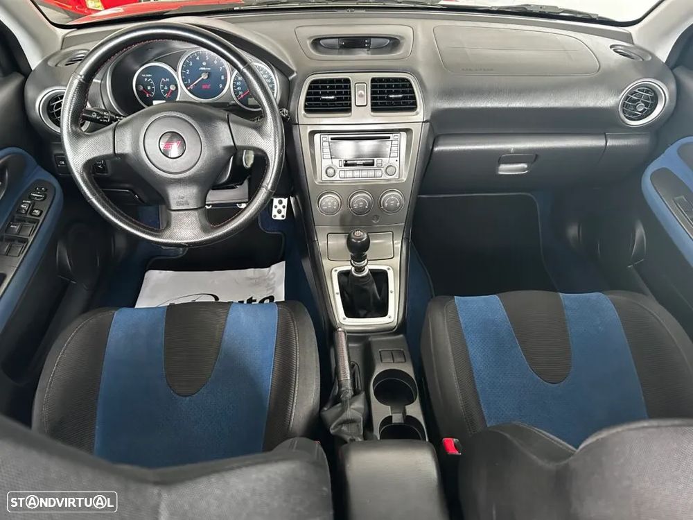 Subaru Impreza Sedan 2.0 WRX STi - 13