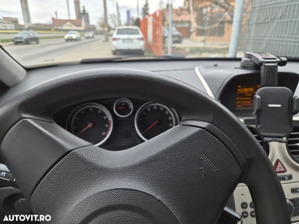 Opel Corsa 1.2i Enjoy - 9