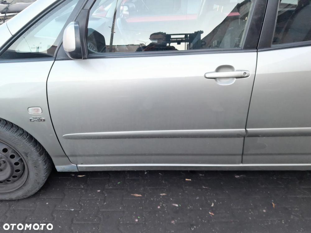Drzwi przednie lewe TOYOTA Corolla Verso I 01-04r. 1D9 - 2