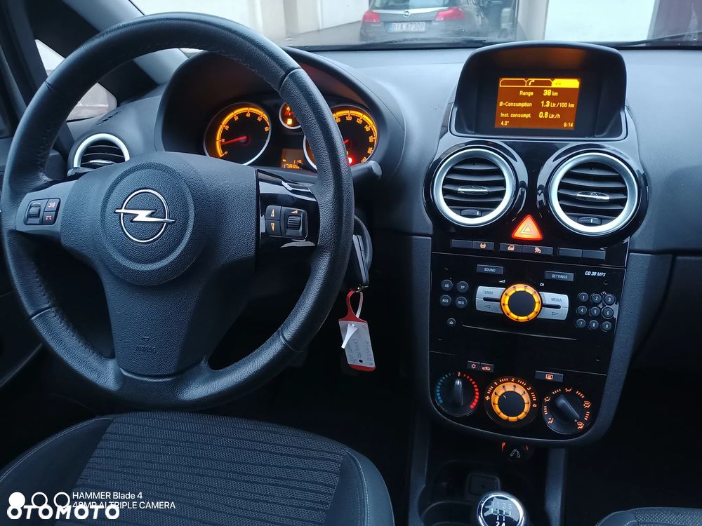 Opel Corsa 1.2 16V Cosmo - 8