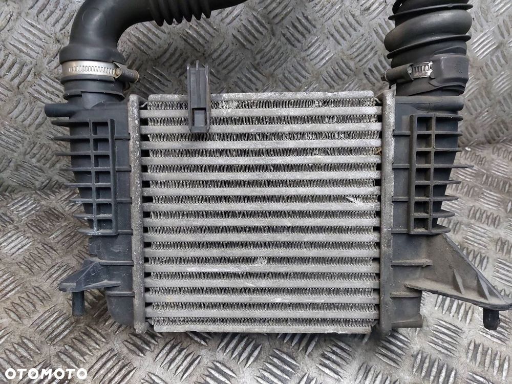 CHŁODNICA POWIETRZA INTERCOOLER + RURY CLIO III 1.5 DCI 8200471885 - 2