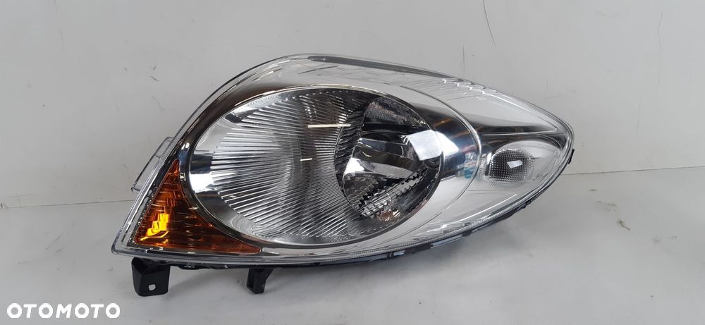 NISSAN NOTE E11 LAMPA PRAWA PRZÓD 260109U10A - 1