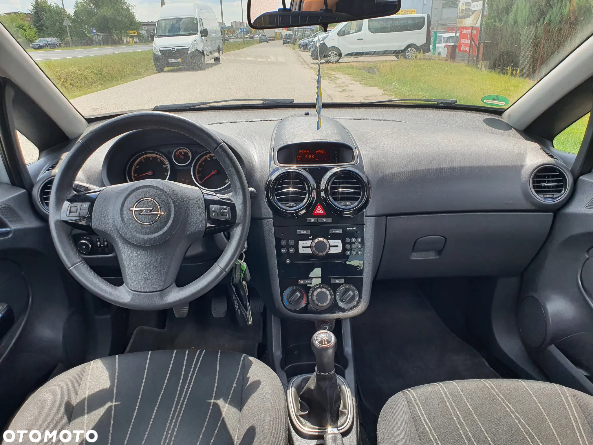 Opel Corsa 1.2 16V Enjoy - 11