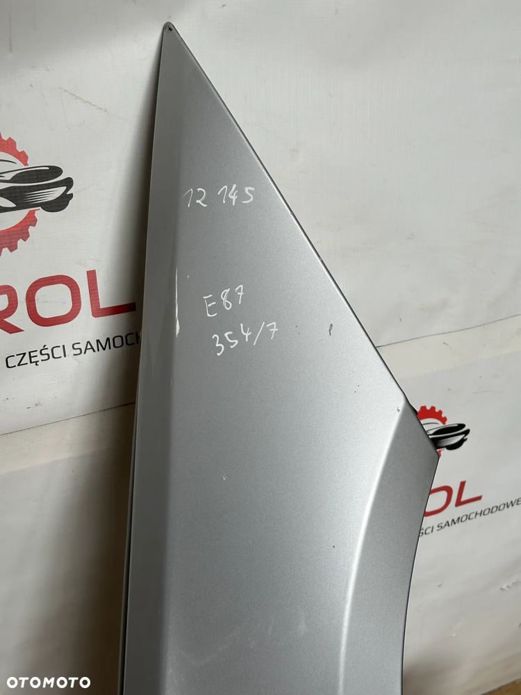 BŁOTNIK PRZEDNI PRAWY BMW E87  354/7 - 2