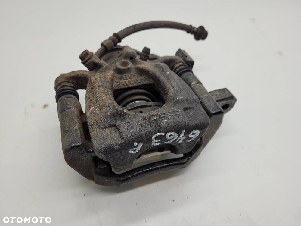 ZACISK HAMULCOWY TYŁ TYLNY PRAWY JARZMO NISSAN X-TRAIL III T32 2.0 DCI - 1