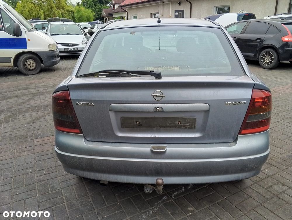 Opel Astra G (03r.) 1.7 CDTI 80KM. Silnik Z17DTL Skrzynia M79/F17 W355  lakier 4AU.Cały na części. GWARANCJA !!!  Przód Tył Zestaw Komplet Drzwi Klapa Zderzak Błotnik Maska Grill Atrapa Szyba Pas Lampa Lusterko Boczki Fotel Kanapa Kokpit Deska Rozdzielcza Przełącznik Włącznik Sterownik Przewody Wiązka Instalacja Moduł Komputer Czujnik Listwa Pompa Alternator Wtryski Głowica Rozrusznik Kompresor Sprzęgło Dwumas Silnik Skrzynia ABS Klimatyzacji Paliwa Wspomagania Kolektor Turbina Przepustnica Zawór Chłodnica Koło Hak Belka Sanki Zawieszenie Mcpherson Półoś Amortyzator Wydech Tłumik Zacisk Most - 4