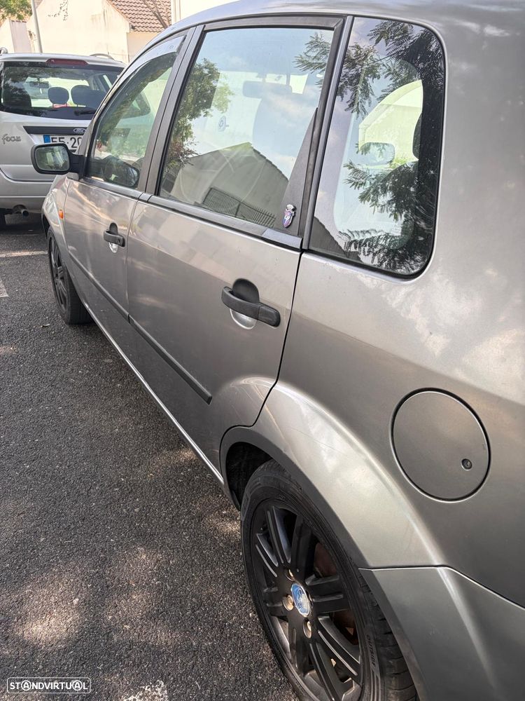 Ford Fiesta 1.4 Ghia - 6
