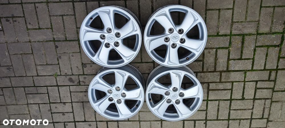 FELGI ALUMINIOWE 529102Y100 5x114,3 6,5x16 CALI ET45 HYUNDAI TUCSON SANTA FE KOMPLET 4 SZTUKI - 1