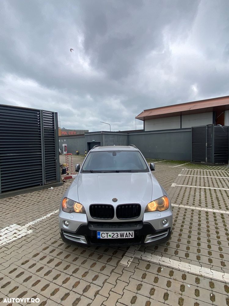 BMW X5 2009 — imagine 8