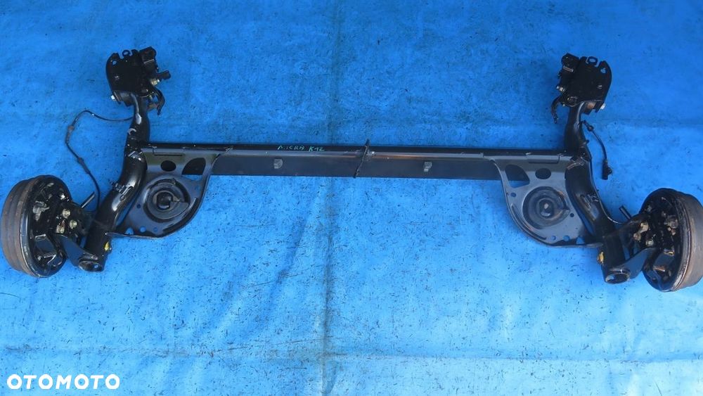 BELKA ZAWIESZENIE OŚ TYŁ TYLNA NISSAN MICRA K12