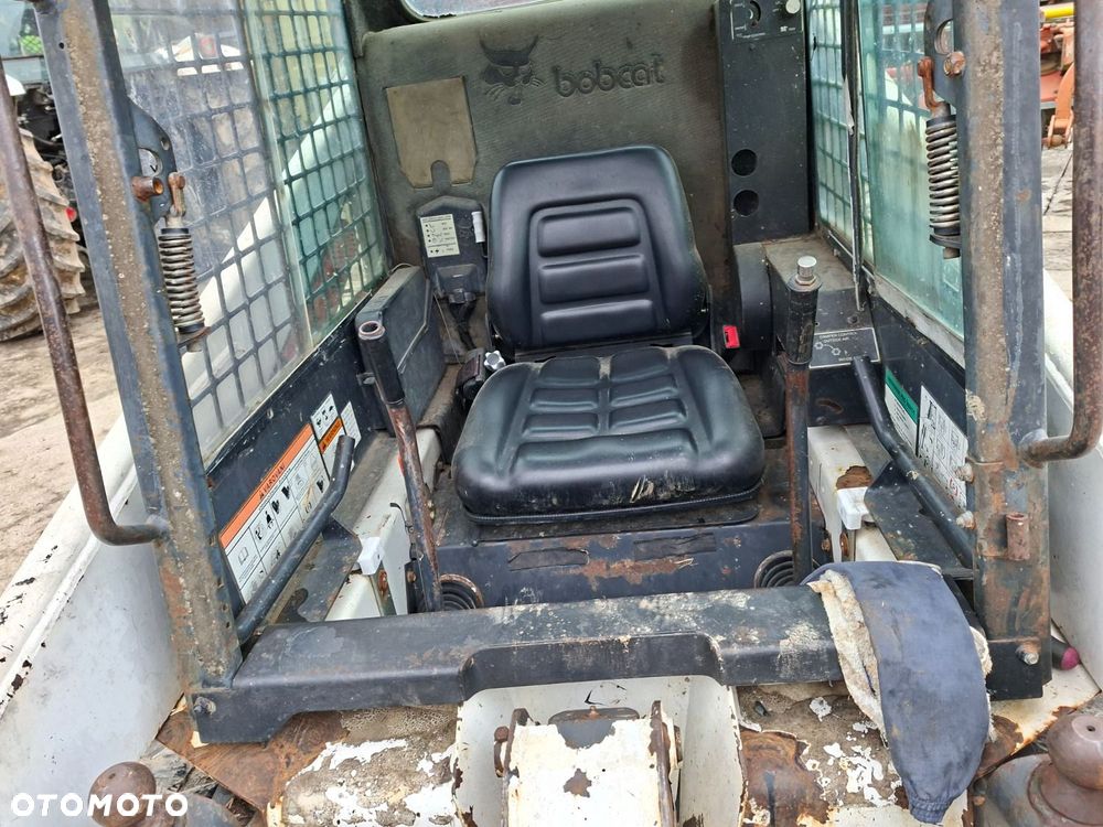 Bobcat 553 4X4 + Melroe Ingersoll-Rand 725S B/H - 12