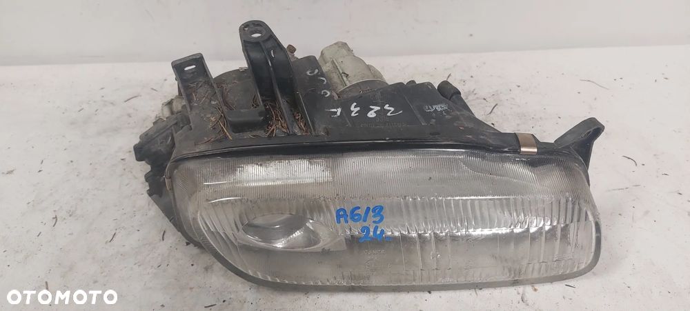 .  PRZOD PRZEDNIA LAMPA PRAWA MAZDA 323F - 2