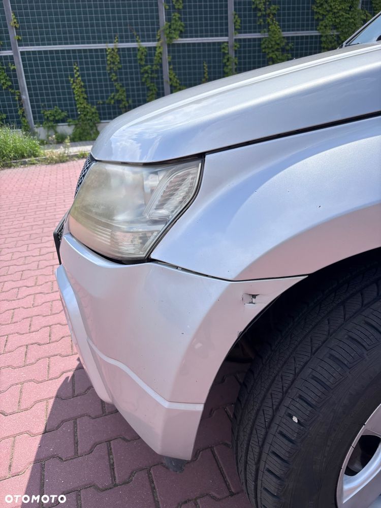 Suzuki Grand Vitara 2.0 Club - 12