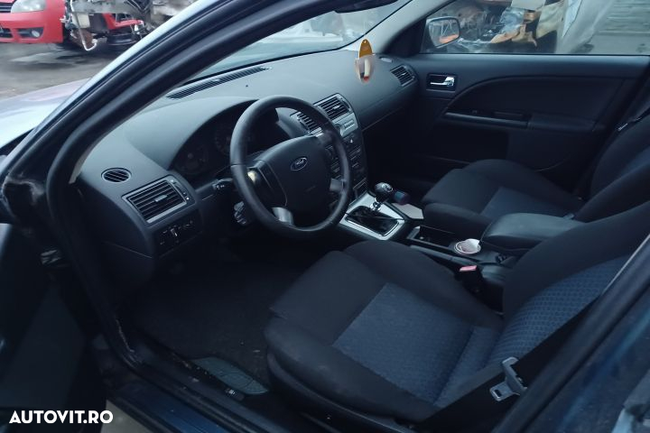 Far stanga Ford Mondeo 3 (facelift)  [din 2003 pana  2007] seria Sedan 2.0 TDCi AT (115 hp) - 7