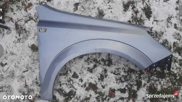 Błotnik prawy lak. z163 Opel Astra H III