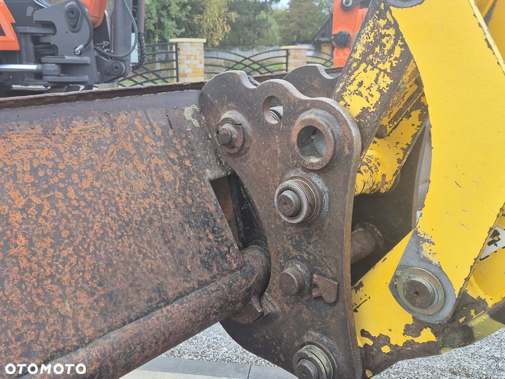 New Holland LB115B/ Maszyna sprowadzona/ - 17