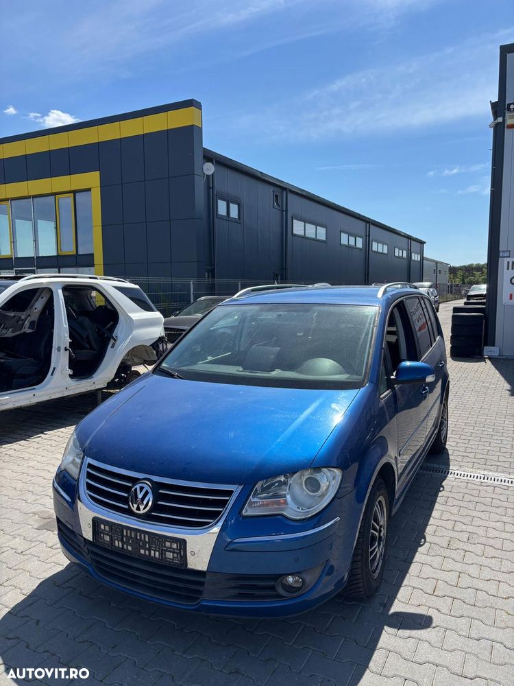 Dezmembram Volkswagen Touran 1.4 benzina (BMY) din 2009 - 2