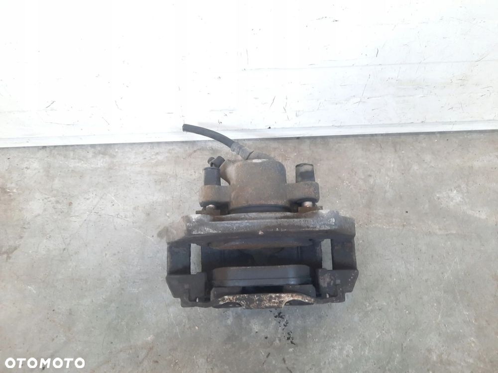 ZACISK PRAWY PRZÓD HAMULCOWY BMW 3 E90 E91 2,0 D - 4