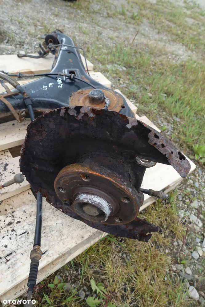 WAHACZ PIASTA ZWROTNICA TYŁ VW T4 Z ABS BEZ ABS - 14