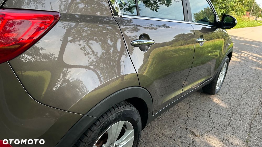 Kia Sportage 2.0 CVVT 4WD Spirit - 14