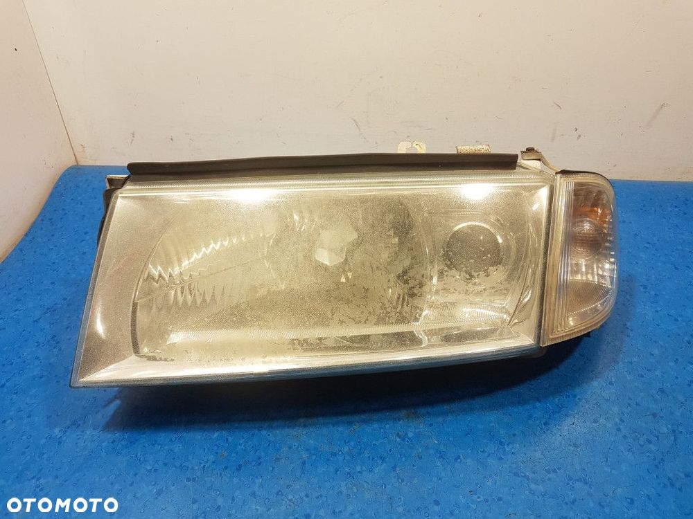 SKODA OCTAVIA I LIFT REFLEKTOR LEWY - 1