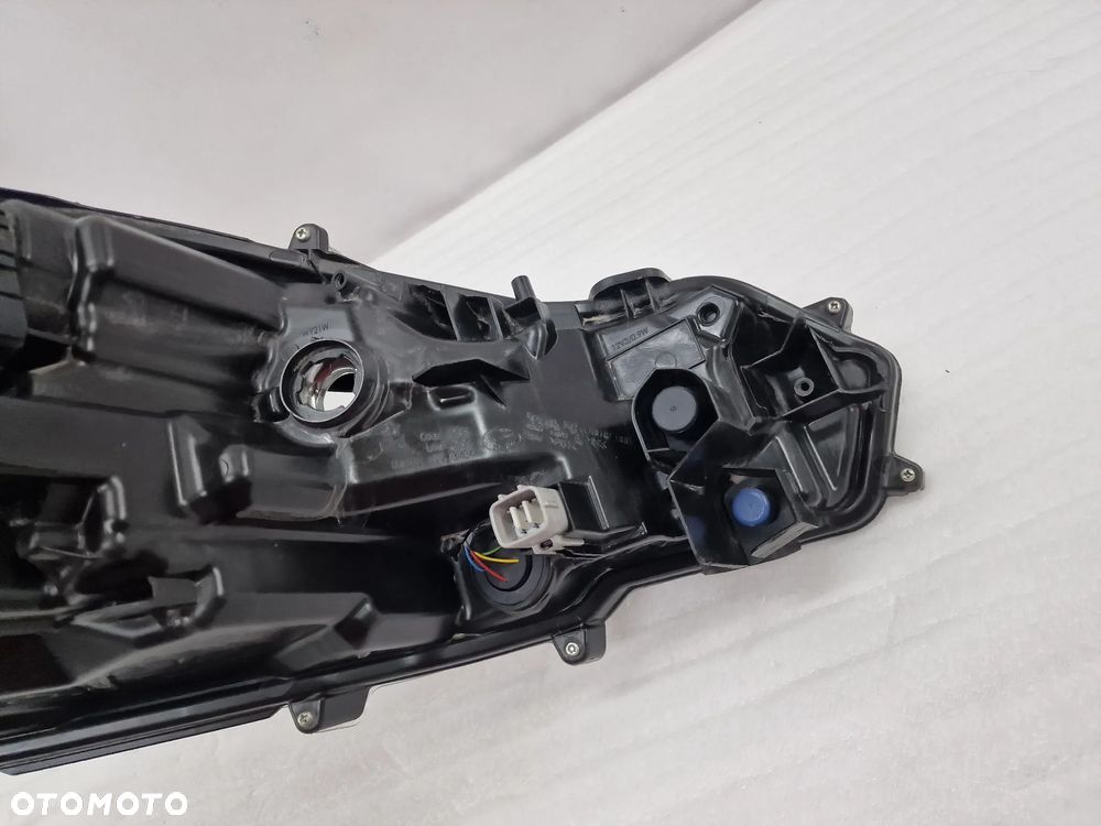 TOYOTA COROLLA E21 18- LEWA / PRAWA ZWYKŁA LAMPA PRZEDNIA PRZÓD SOCZEWKA , NR 81110-02T31-00 / 81150-02T31 / 81150-02T31-00 , NR AUKCJI LA372 - 26