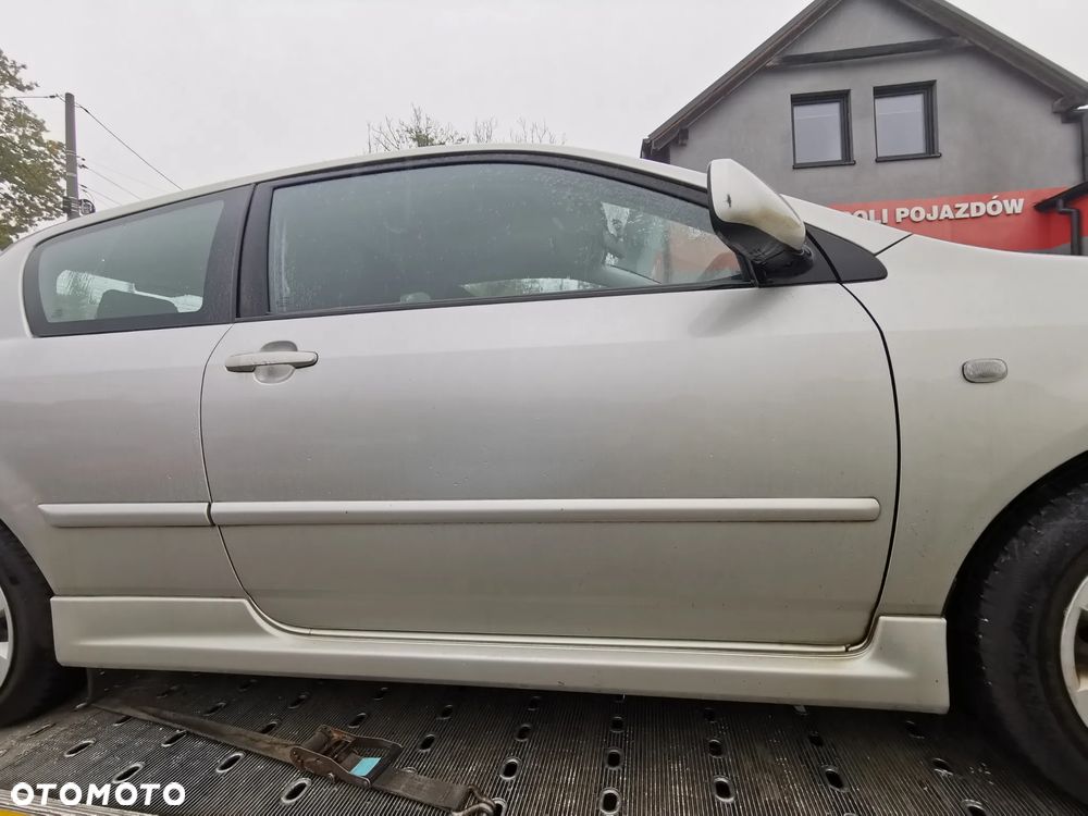 Drzwi prawe Toyota Corolla E12 2004r 3D - 1