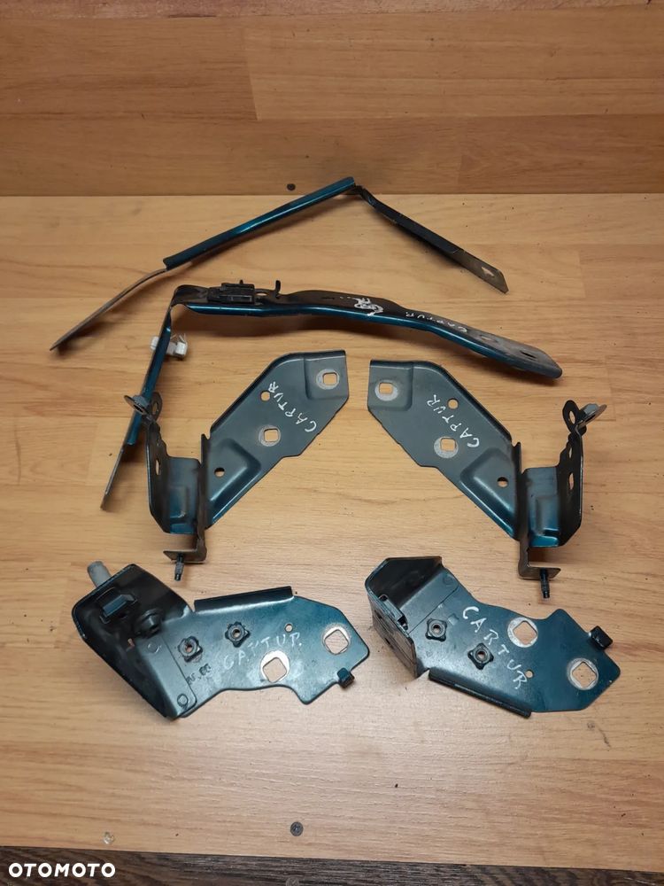 mocowanie  wspornik lampy  błotnika renault captur I lift