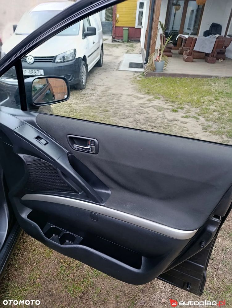 Toyota Corolla Verso 1.8 Sol + - 12