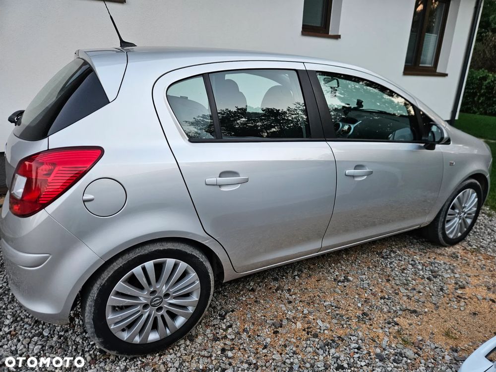 Opel Corsa 1.4 16V Enjoy - 11