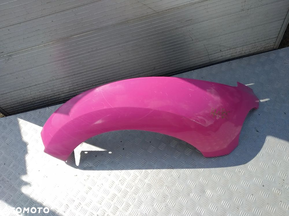 H186  BŁOTNIK LEWY TYŁ VW NEW BEETLE - 1